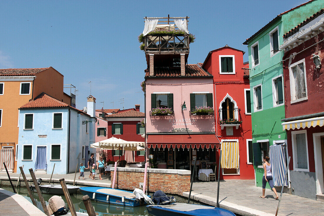Traditional Colorful Houses Along the Canal in the Center of Burano Island in the Lagoon of Venice, Venetia, Italy