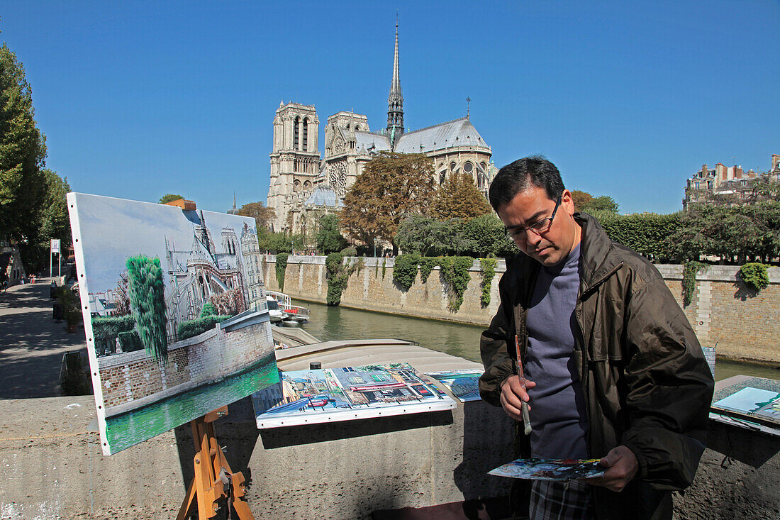 Artist Painting Notre Dame Cathedral on a Quay of the Seine, 4Th Arrondissement, Paris, France