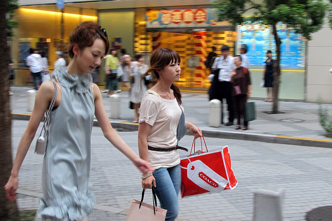 Japanese Women with Their Purchases, Shopping in the Chic, Luxury Boutique Neighborhood of Ginza, Tokyo, Japan