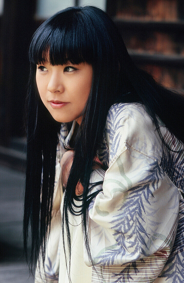 Portrait of a Young Japanese Woman Wearing a Light Kimono, Kyoto, Japan, Asia