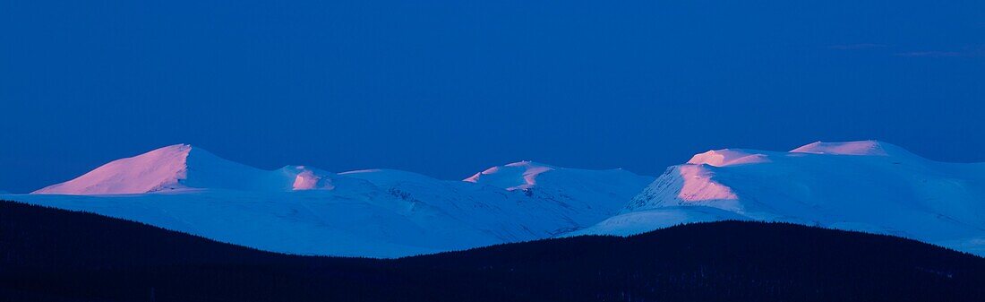 Scotland, Scottish Highlands, Cairngorms National Park The Cairngorms Massif, viewed at dawn from Grantown on Spey