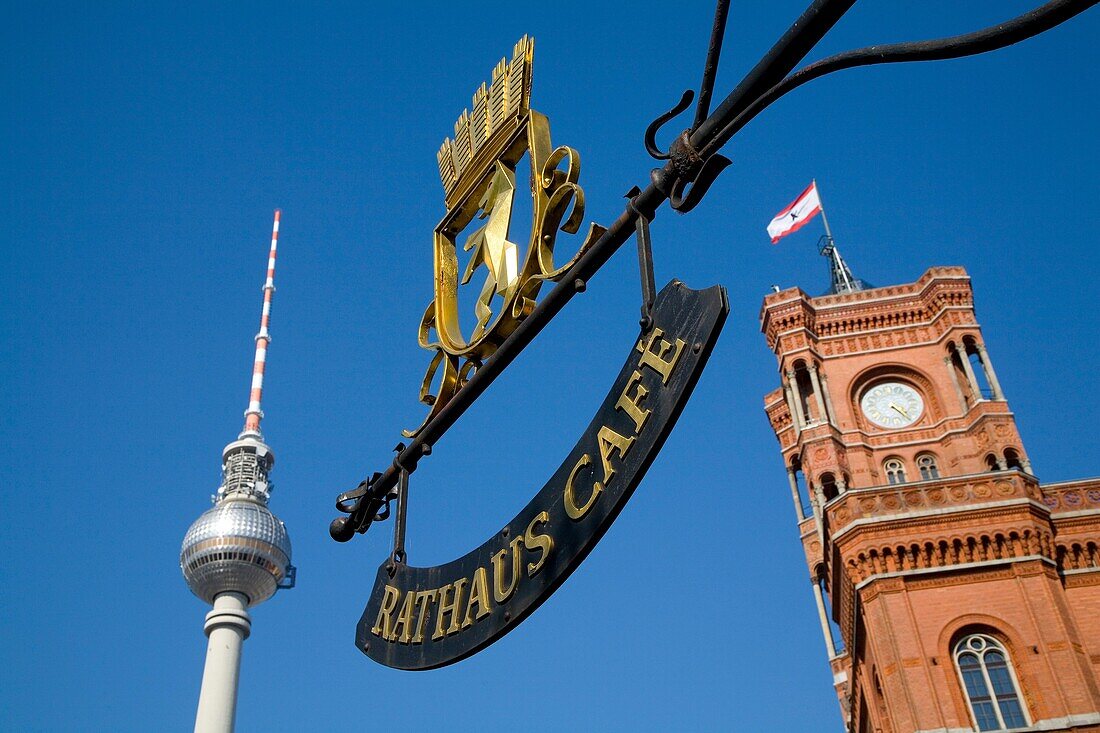 Tv Tower and Red City Hall behand Cafe Sign Berlin Germany