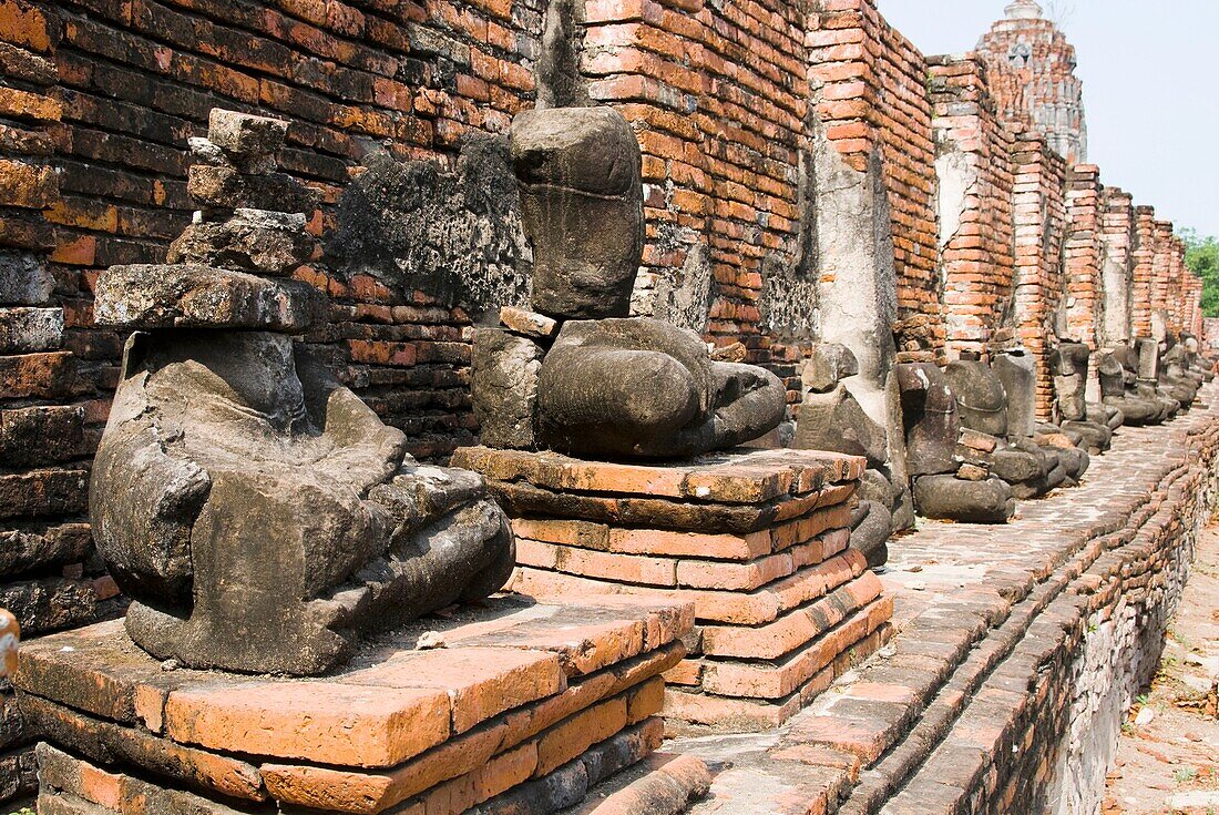 wreckage of buddha image at wat Mahathat, ayutthaya, thailand