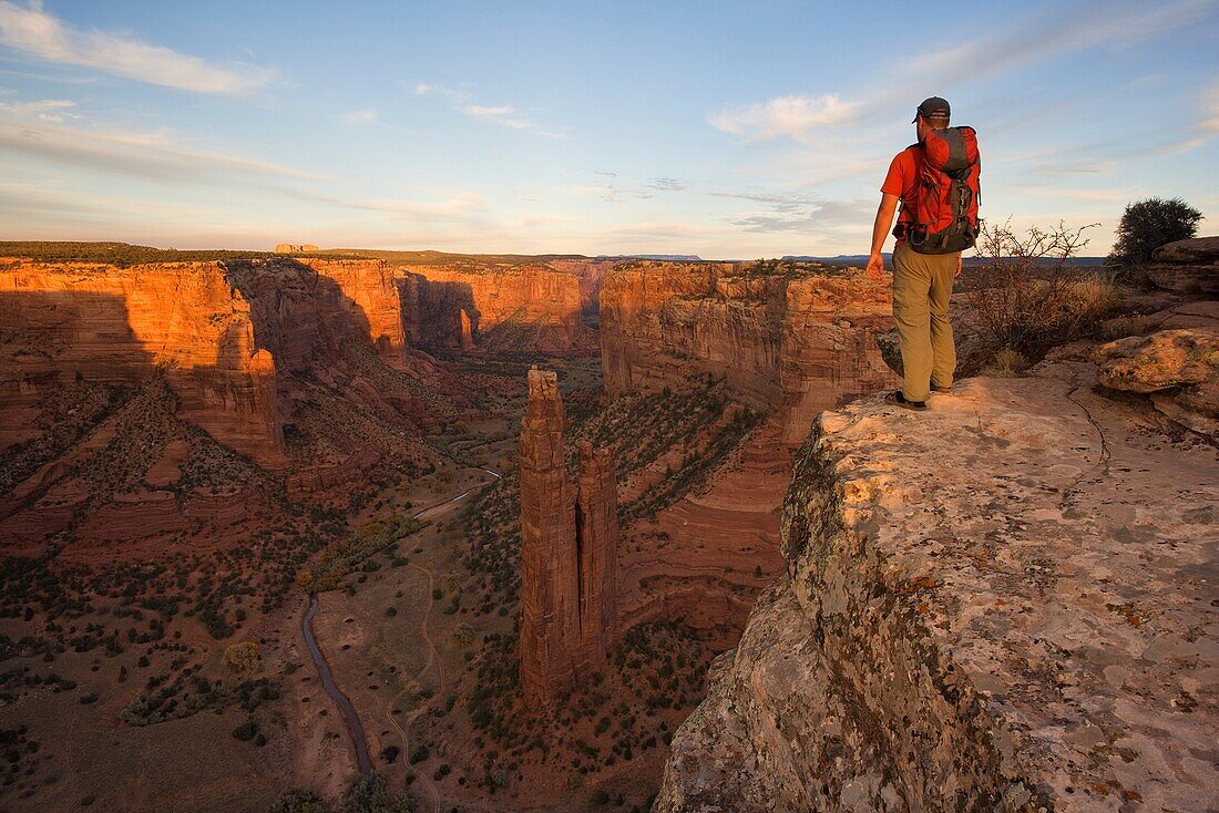 Hiker at the Spider rock Viewpoint in the Canyon de Chelly, Arizona
