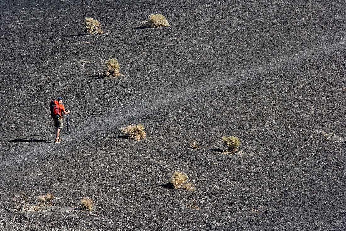 Hiker at Ubehebe crater, Death valley national park