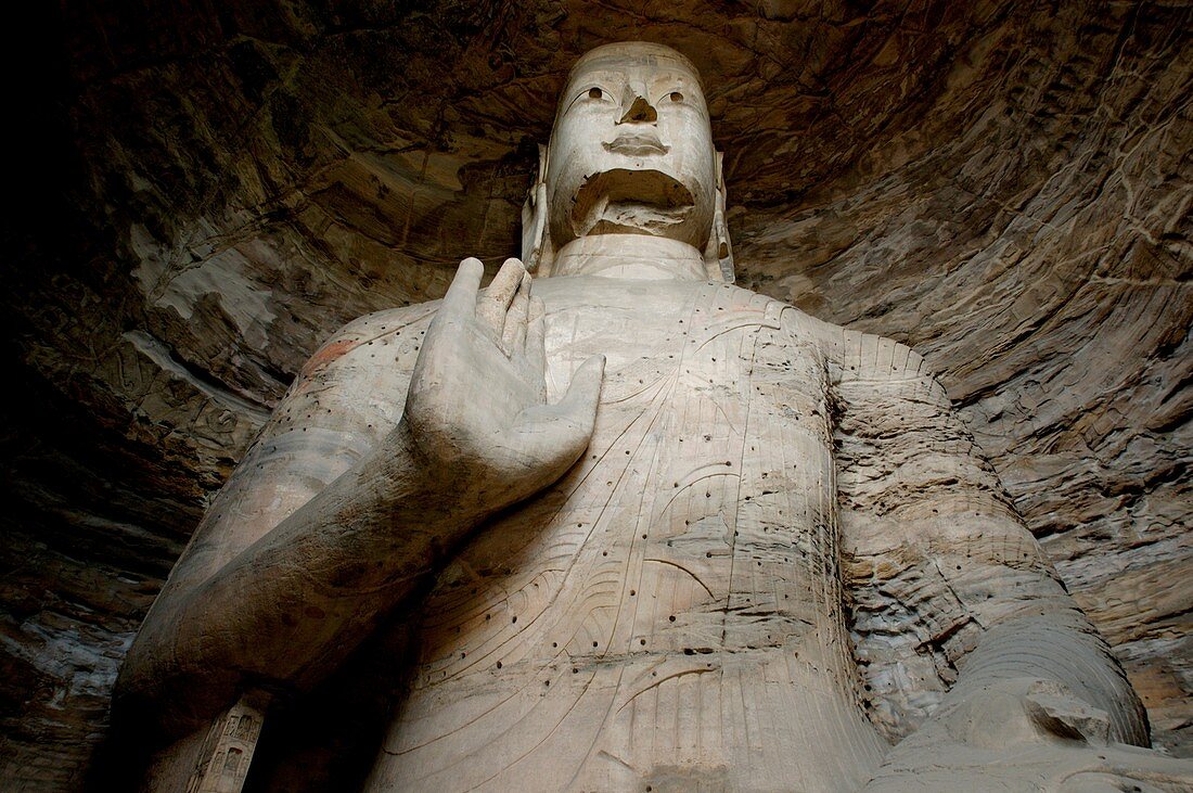 China shanxi yungang shiku caves near datong a giant buddha statue carved inside a grotto