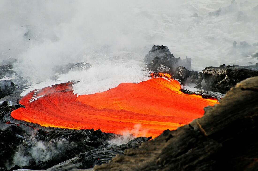 River of molten lava flowing to the sea, Kilauea Volcano, Hawaii Islands, United States