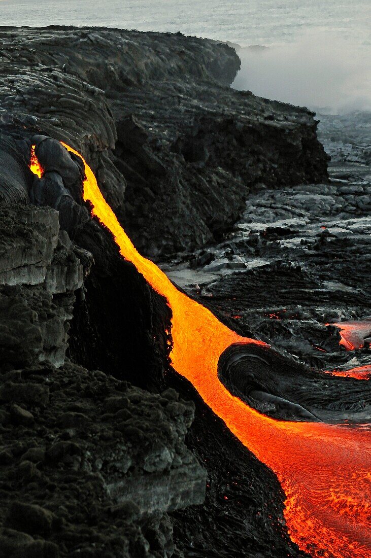 River of molten lava flowing to the sea, Kilauea Volcano, Hawaii Islands, United States