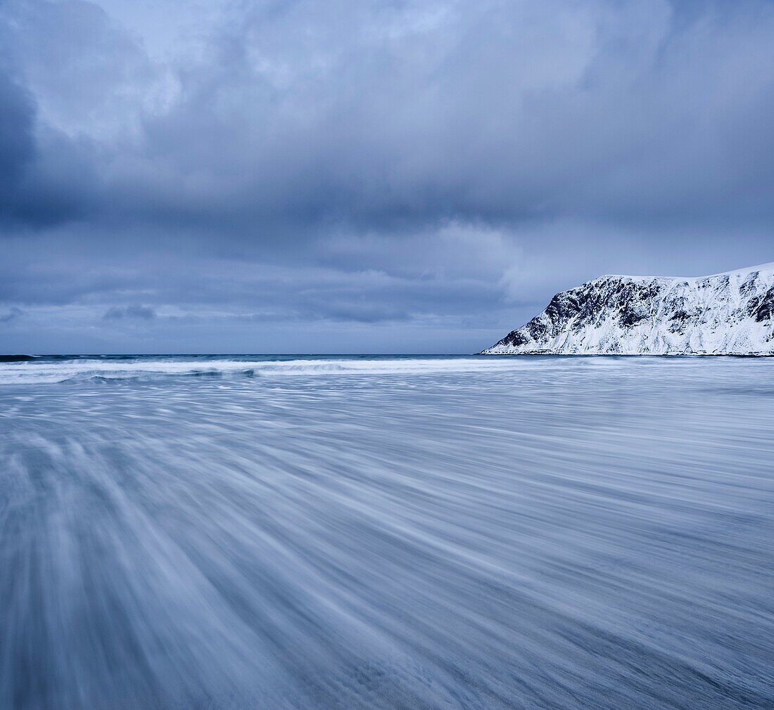 waves move across Skagsanden Beach, Flakstad, Flakstadøy, Lofoten islands, Norway