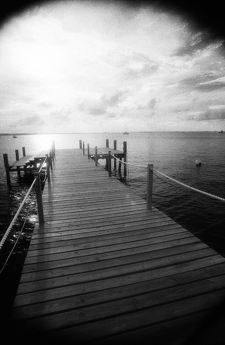 Pier and sea, b&w