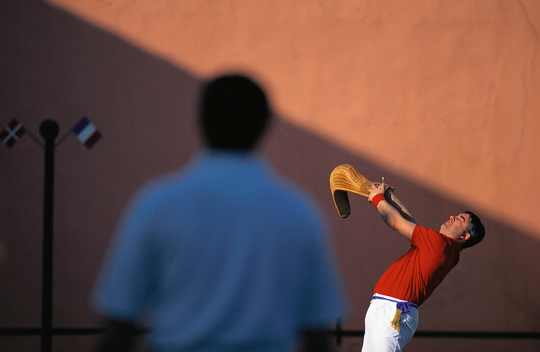 Men playing pelota