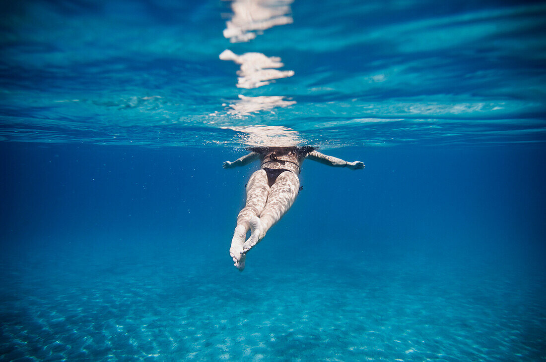 Swimming in the Natural Park of L'Asinara, Sardinia