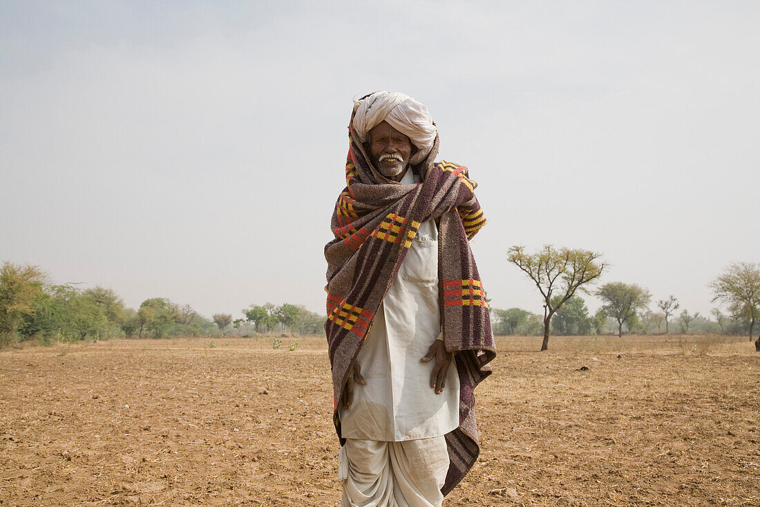 Elderly Man in Field, India