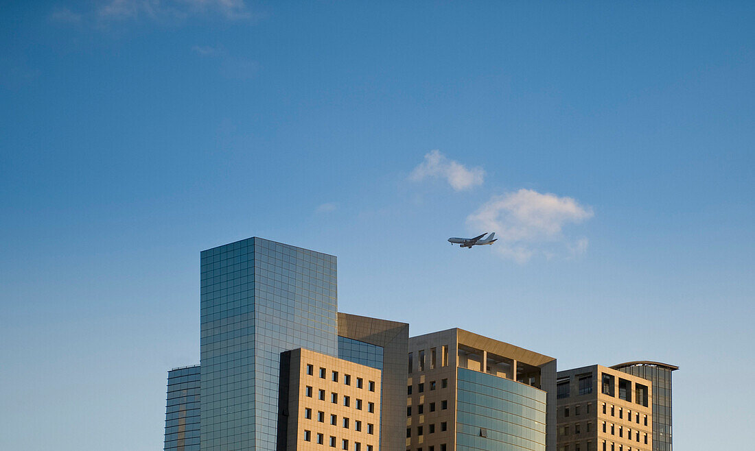 Airplane Flying Over Office Buildings, Tel Aviv, Israel