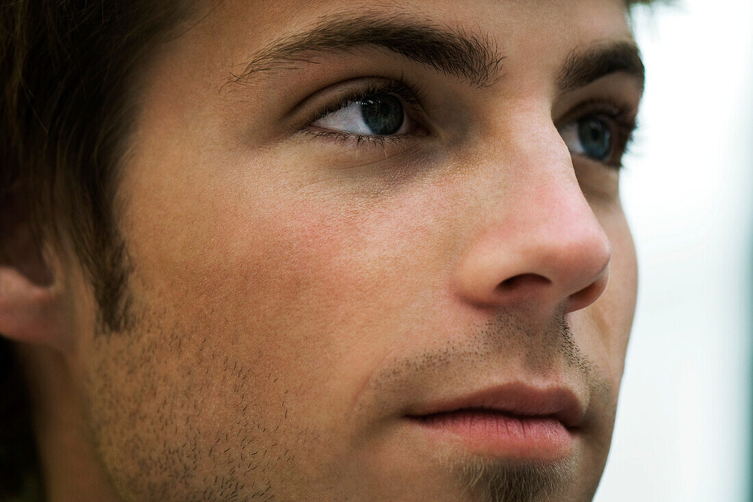 Man daydreaming, close-up