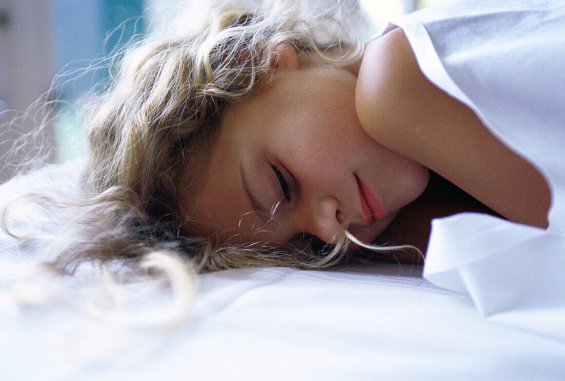 Girl sleeping in bed