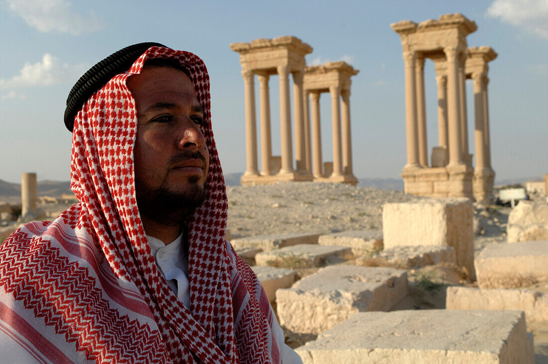 Syria, Palmyra, man near tetrapylon