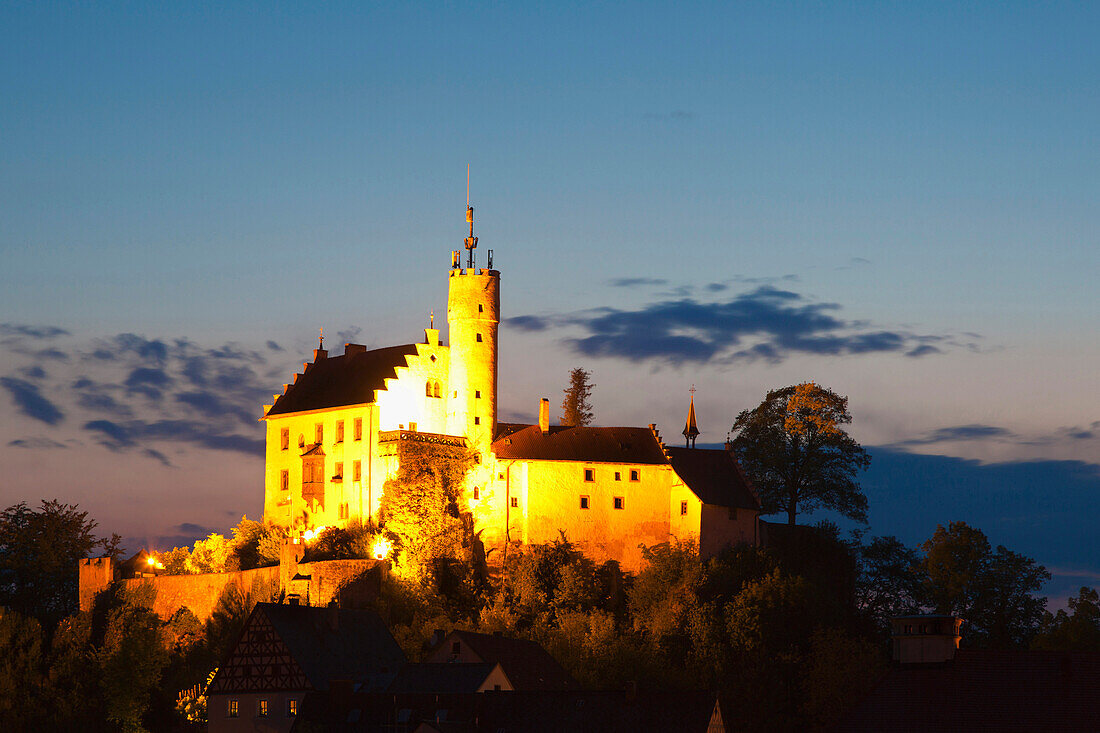 The illuminated castle in the evening, Goessweinstein, Fraenkische Schweiz, Franconia, Bavaria, Germany, Europe