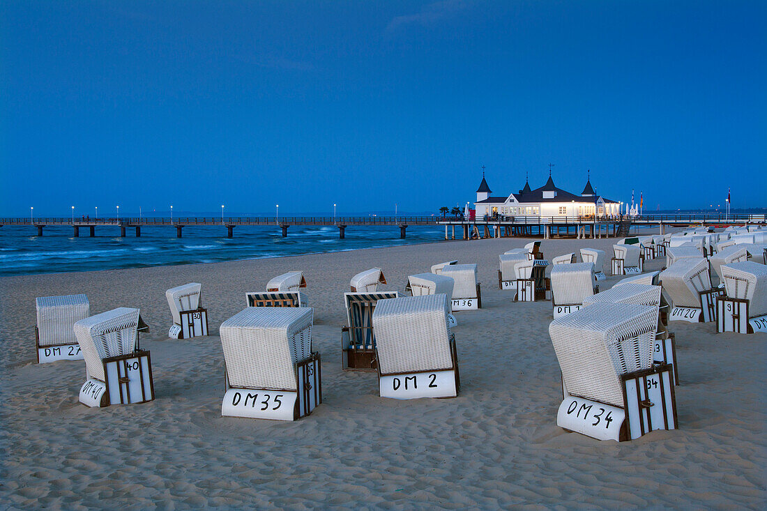 Beach chairs and pier in the evening, Ahlbeck seaside resort, Usedom island, Baltic Sea, Mecklenburg-West Pomerania, Germany