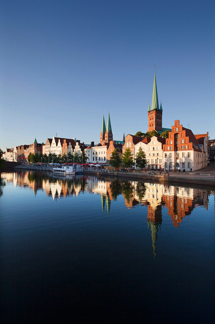 View over river Trave to old town with St. Mary' s church and church of St Peter, Hanseatic City of Luebeck, Schleswig Holstein, Germany