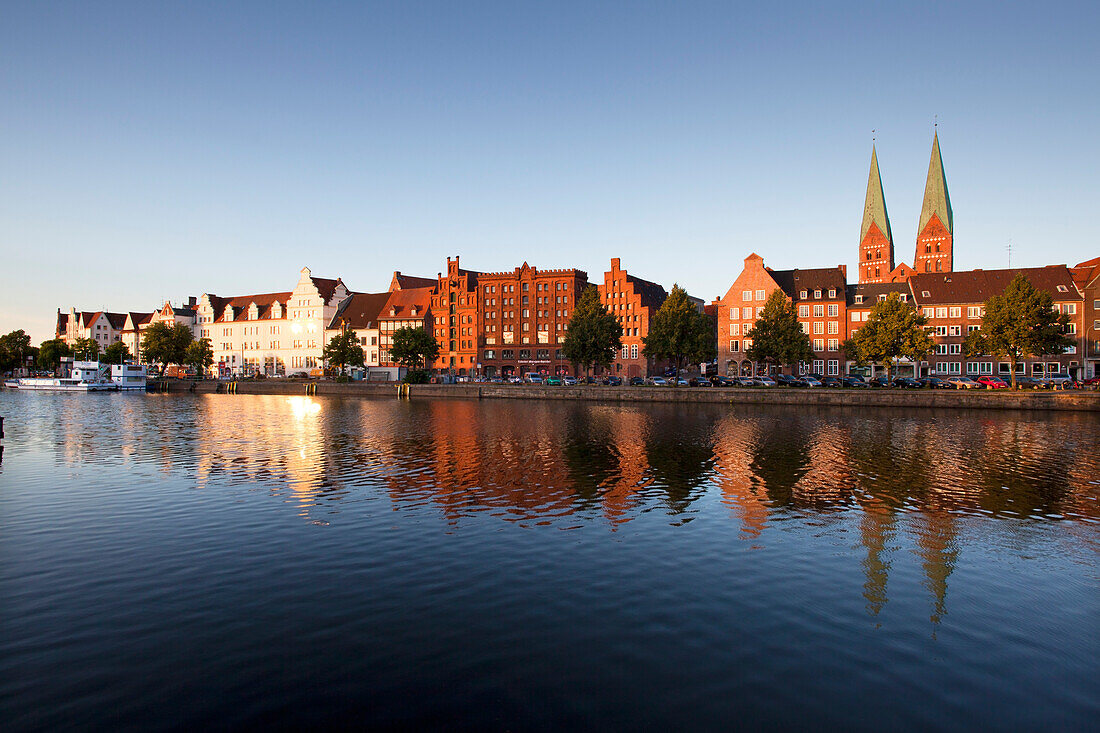 Old storehouses at Holsten harbour, St Mary´s church, Hanseatic city of Luebeck, Baltic Sea, Schleswig-Holstein, Germany