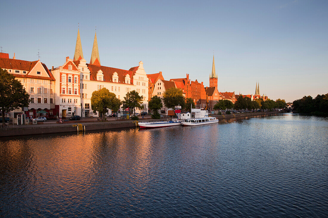 View over harbor to gabled houses, St. Mary' s church and church of St Peter, Hanseatic City of Luebeck, Schleswig-Holstein, Germany