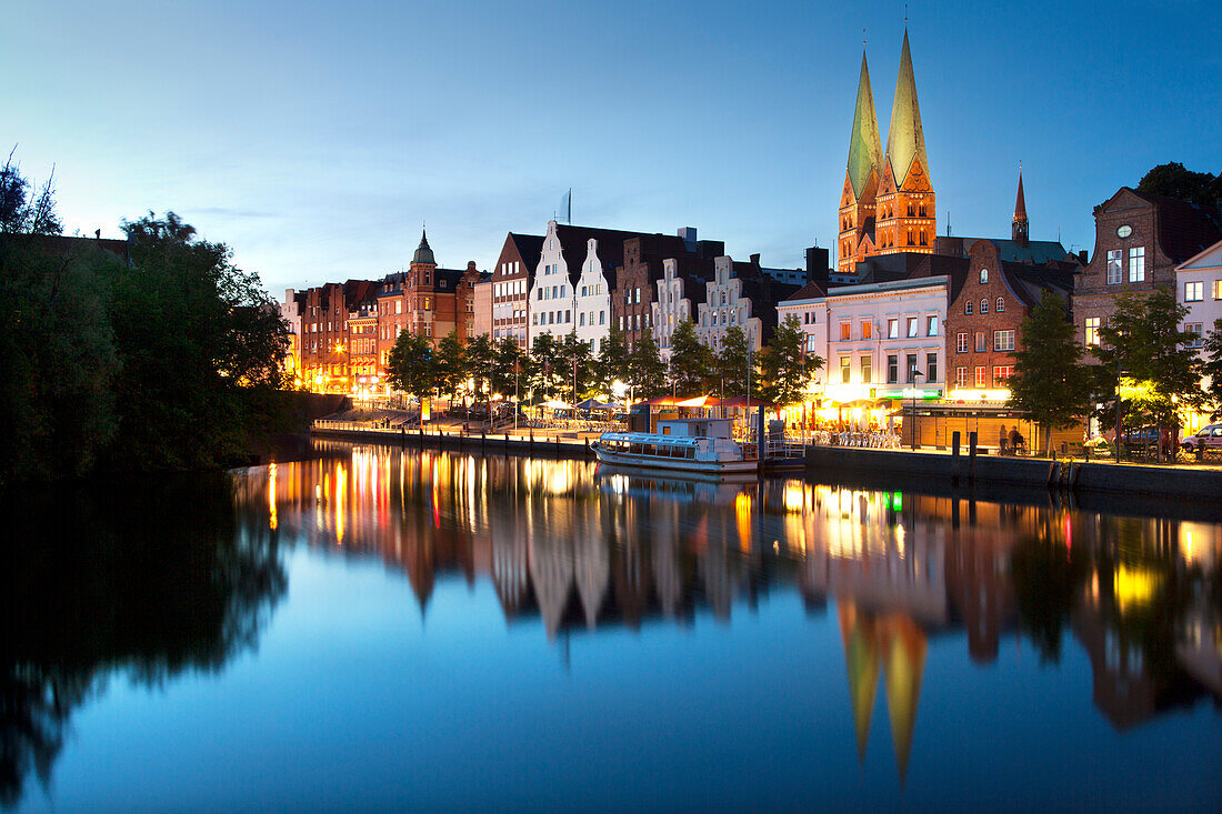 View over the Trave river to the old town of Luebeck with St Mary´s church, Hanseatic city of Luebeck, Baltic Sea, Schleswig-Holstein, Germany