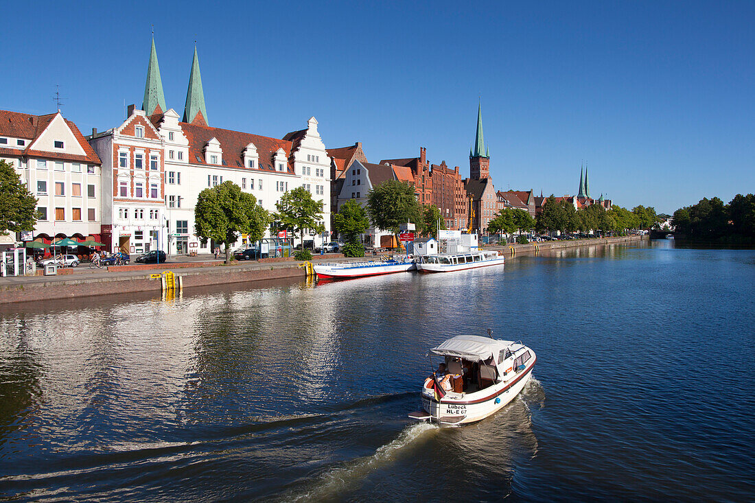 Houses with stepped gables at Holsten harbour, St. Mary´s church and church of St Petri, Hanseatic city of Luebeck, Baltic Sea, Schleswig-Holstein, Germany