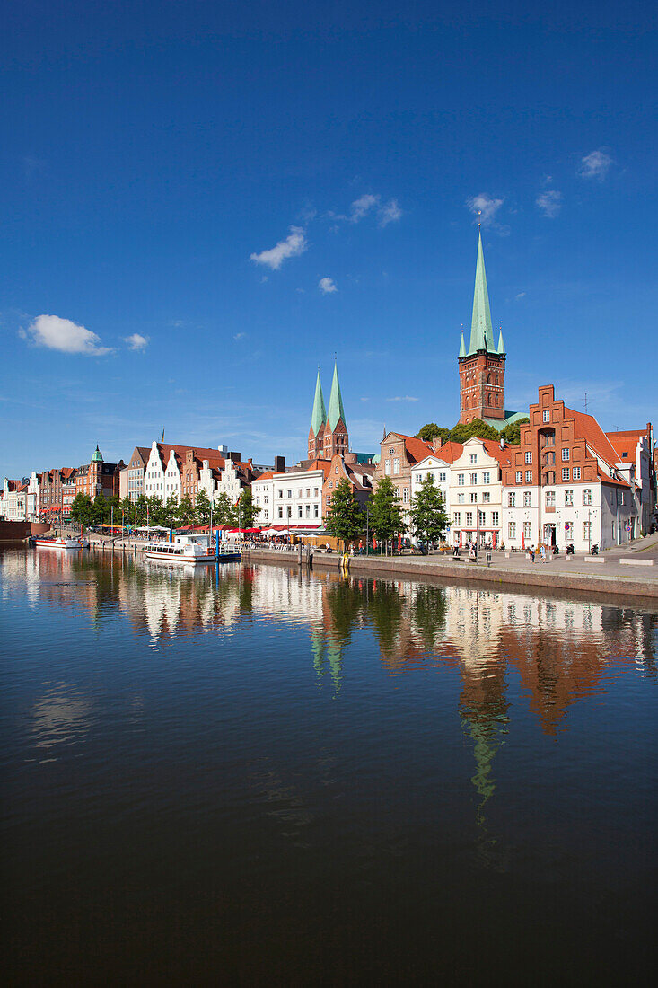 View over river Trave to old town with St Mary' s church and church of St. Peter, Hanseatic City of Luebeck, Schleswig Holstein, Germany