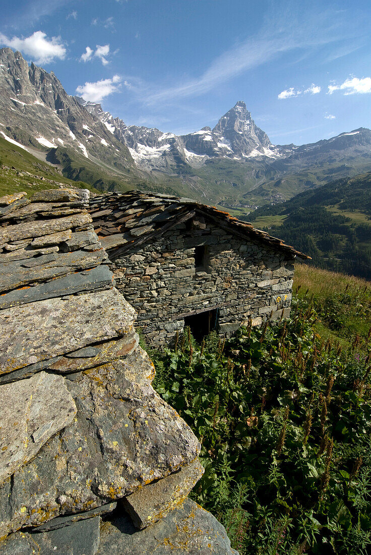 Italy, Aosta valley, near Breuil-Cervinia, sheepfolds with flagstone roofs, Matterhorn in background