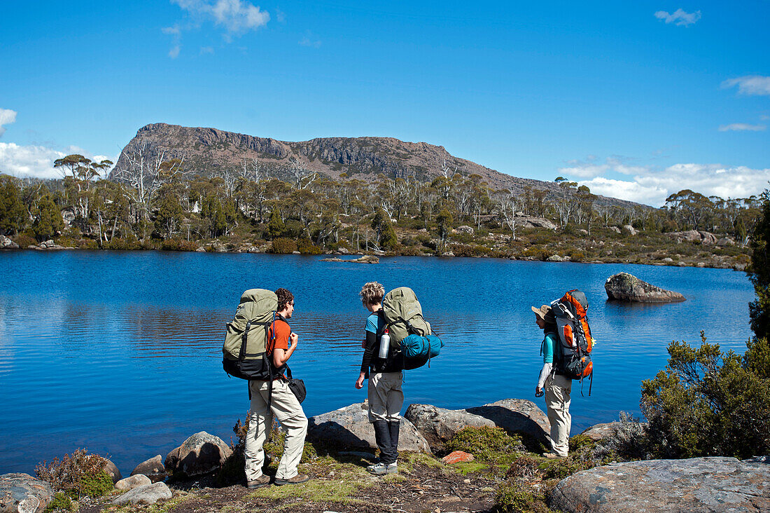 Three trekker at Solomons Jewels, Walls of Jerusalem National Park, UNESCO World Nature Site, Tasmania, Australia