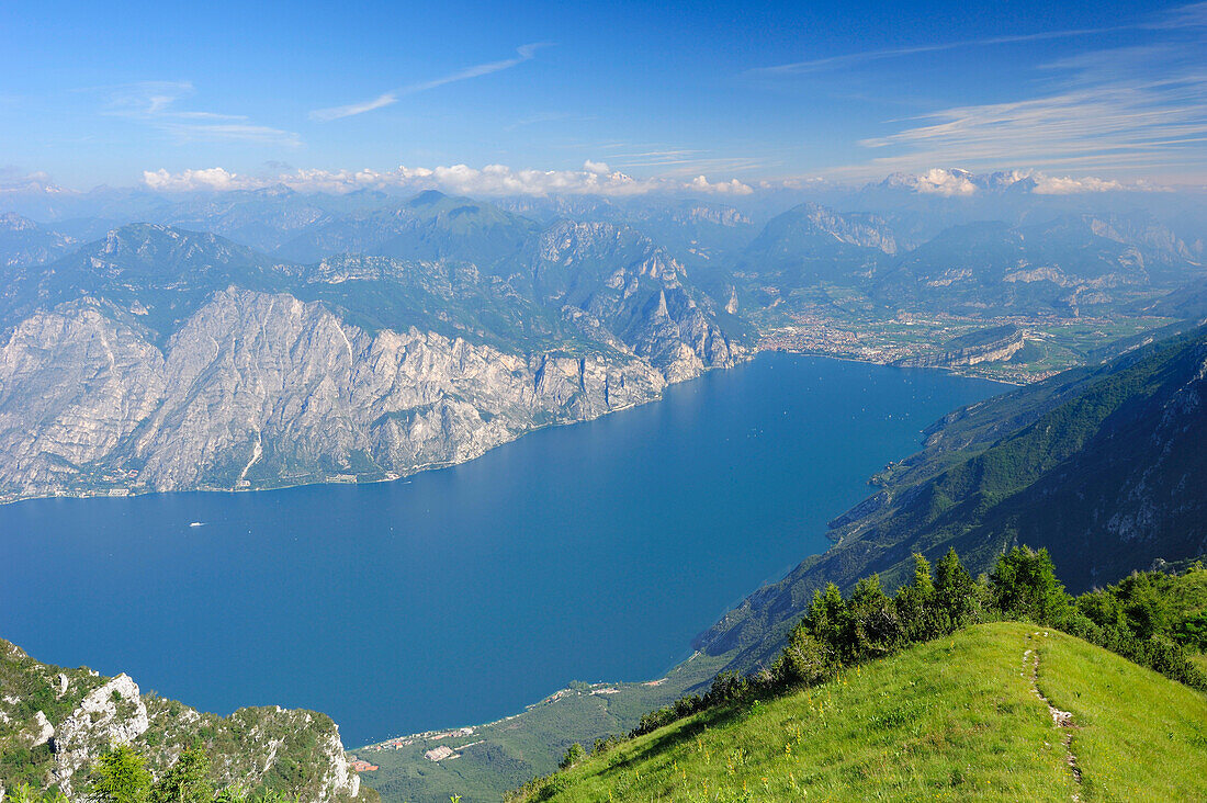 View over lake Garda to Riva and mountain range of Lake Garda, Monte Baldo, Trentino-Alto Adige/Suedtirol, Italy