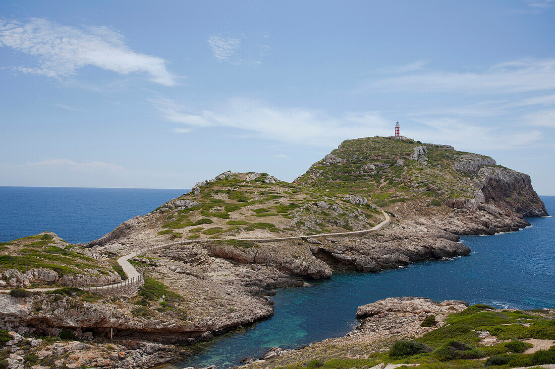Lighthouse and coast area under clouded sky, Punta de Anciola, Cabrera island, Balearic Islands, Spain, Europe