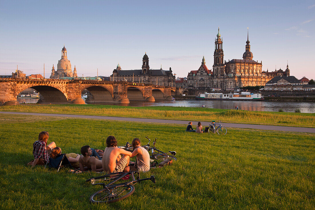 Canaletto view, view over the Elbe river to Augustus bridge, Frauenkirche, Staendehaus, Hofkirche and Dresden castle in the evening light, Dresden, Saxonia, Germany, Europe