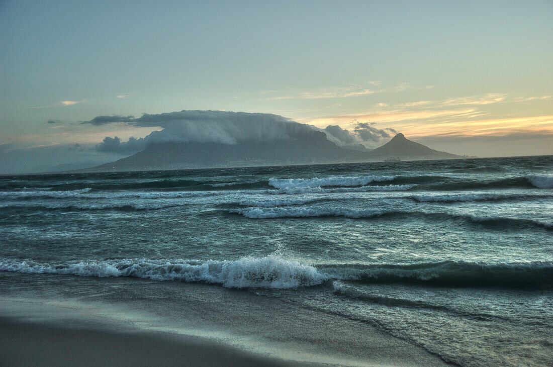 View of table mountain from Blouberg beach at sunset, Cape Town, South Africa