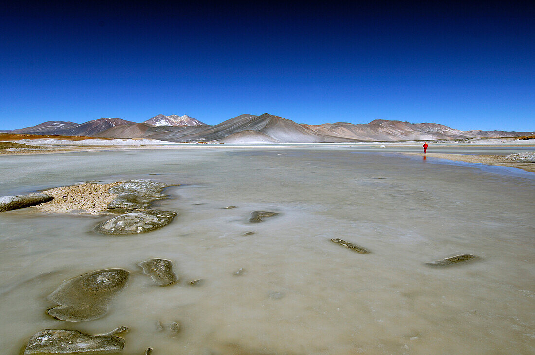 Chile, San Pedro de Atacama, Laguna de Aguas Calientes, lake, person in the back