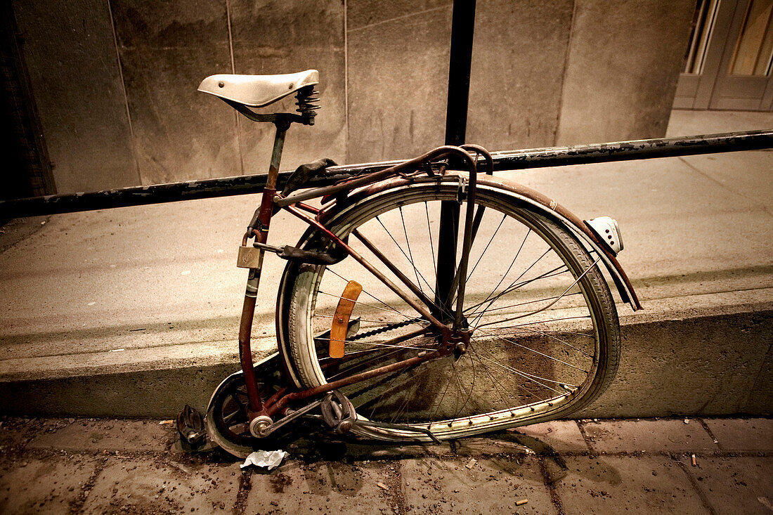 Half Bicycle Chained to Railing, Broken