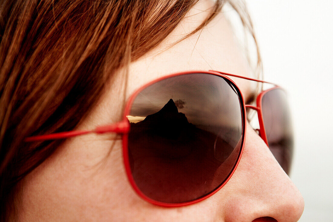 Reflection of the Rock of Gibraltar in Woman's Sunglasses