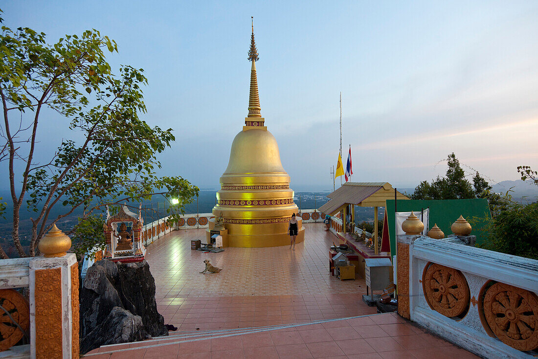 Small golden pagoda on top of a temple hill in the evening, buddhist monastery Tiger Cave Temple, Wat Tahm Sua, Wat Tham Sua, Krabi, Thailand, Asia