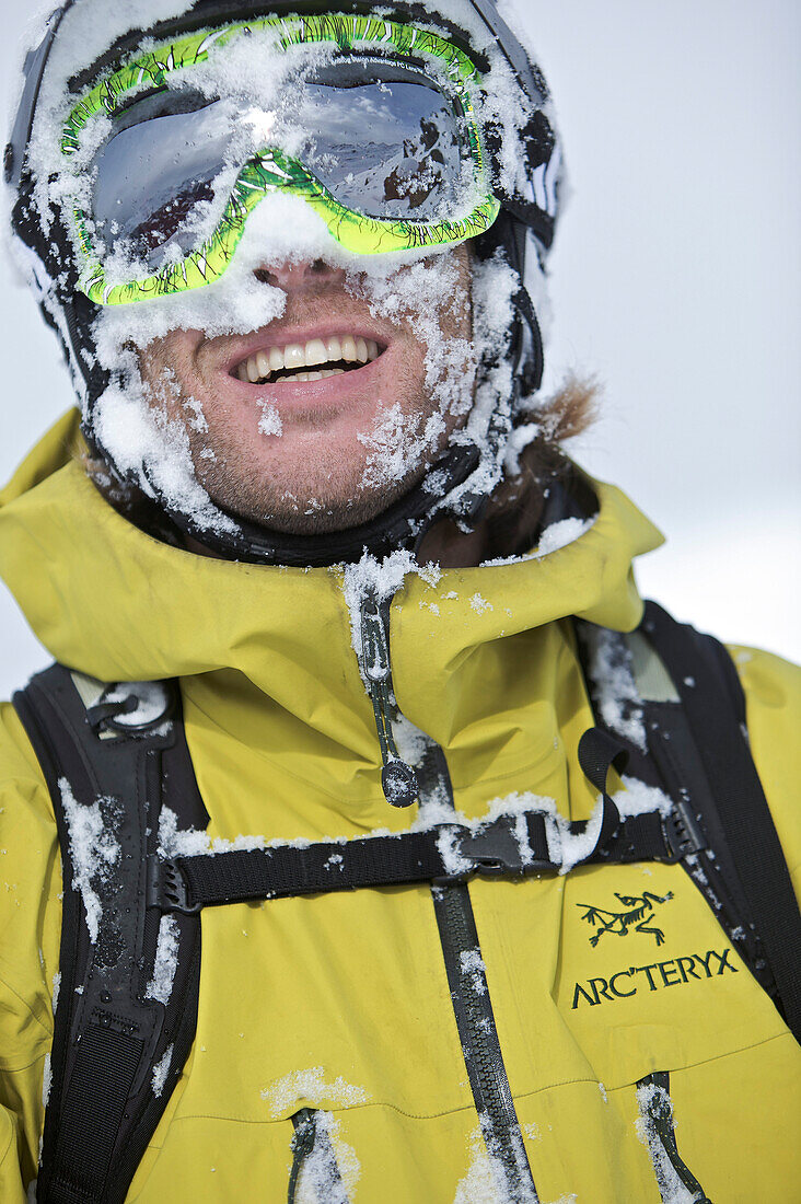 Snwo-covered face of a snowboarder, Chandolin, Anniviers, Valais, Switzerland