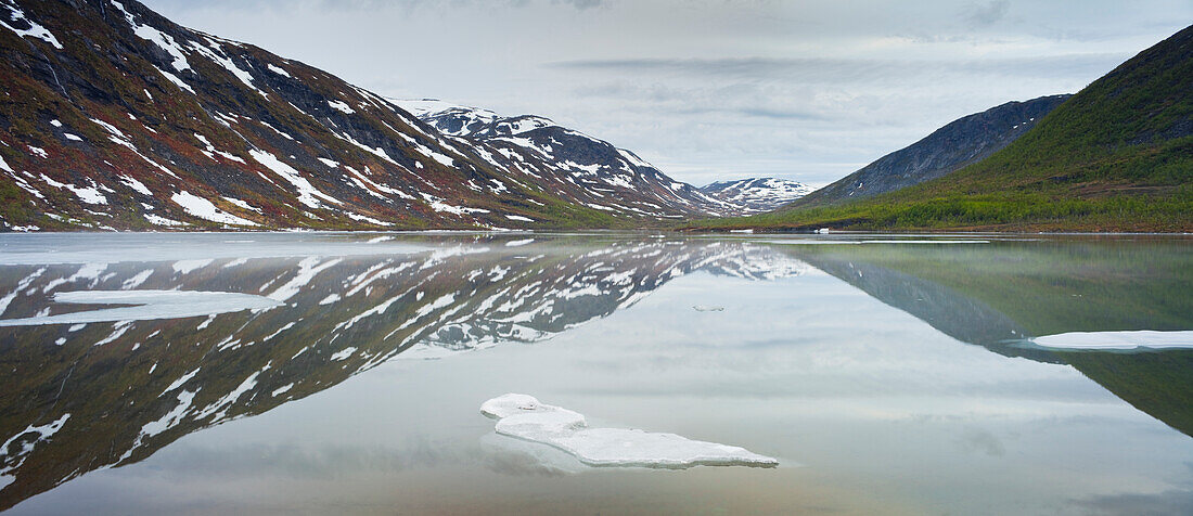 Ice floes on lake Kapervanet, Kaperdalen, Erstfjord, Senja island, Troms, Norway