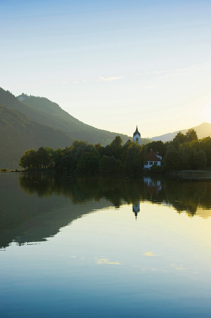 Church of St. Walburga at lake Weissensee, Fuessen, Allgaeu, Bavaria, Germany