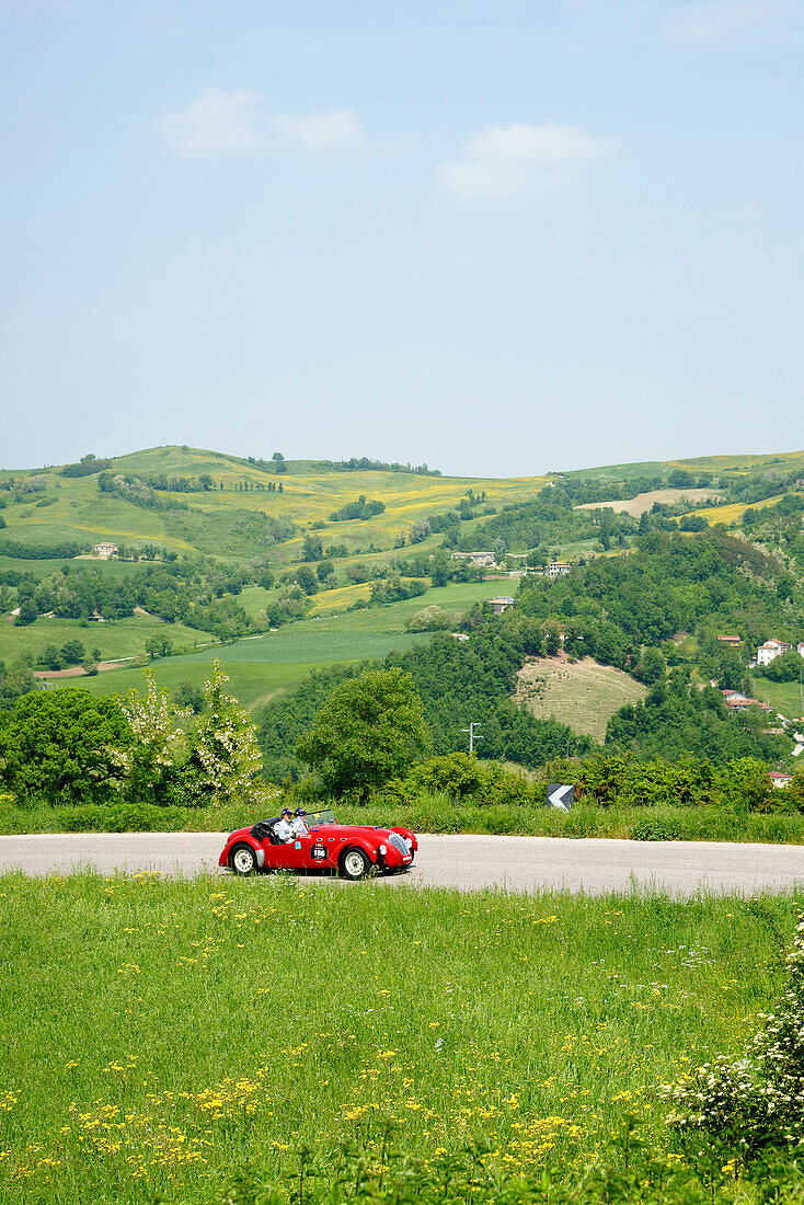 Vintage car on a country road, Monte Cerignone, Pesaro Urbino, Italy, Europe