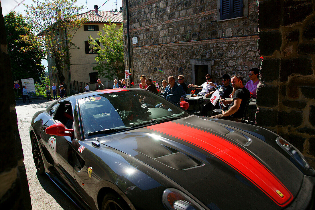 Sports car at the town of Radicofani, Tuscany, Italy, Europe