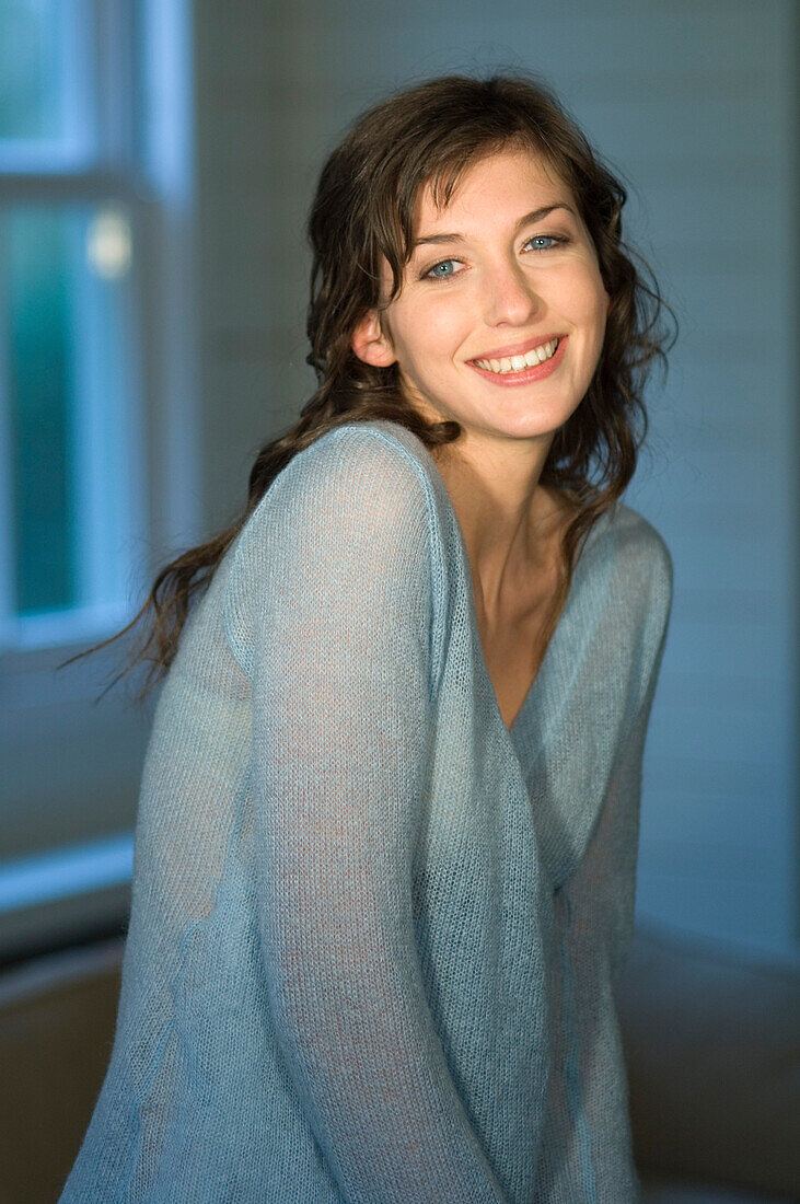 Portrait of a young woman smiling for the camera