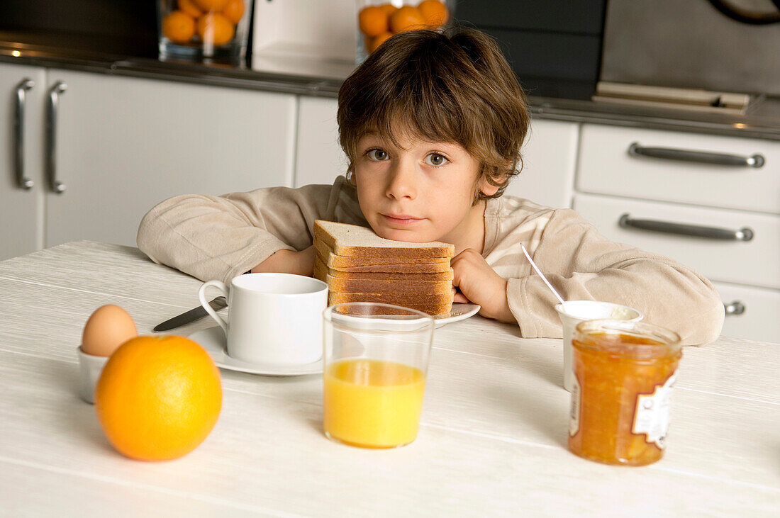 Portrait of a boy having breakfast