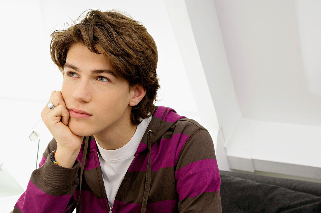 Close-up of a teenage boy looking serious