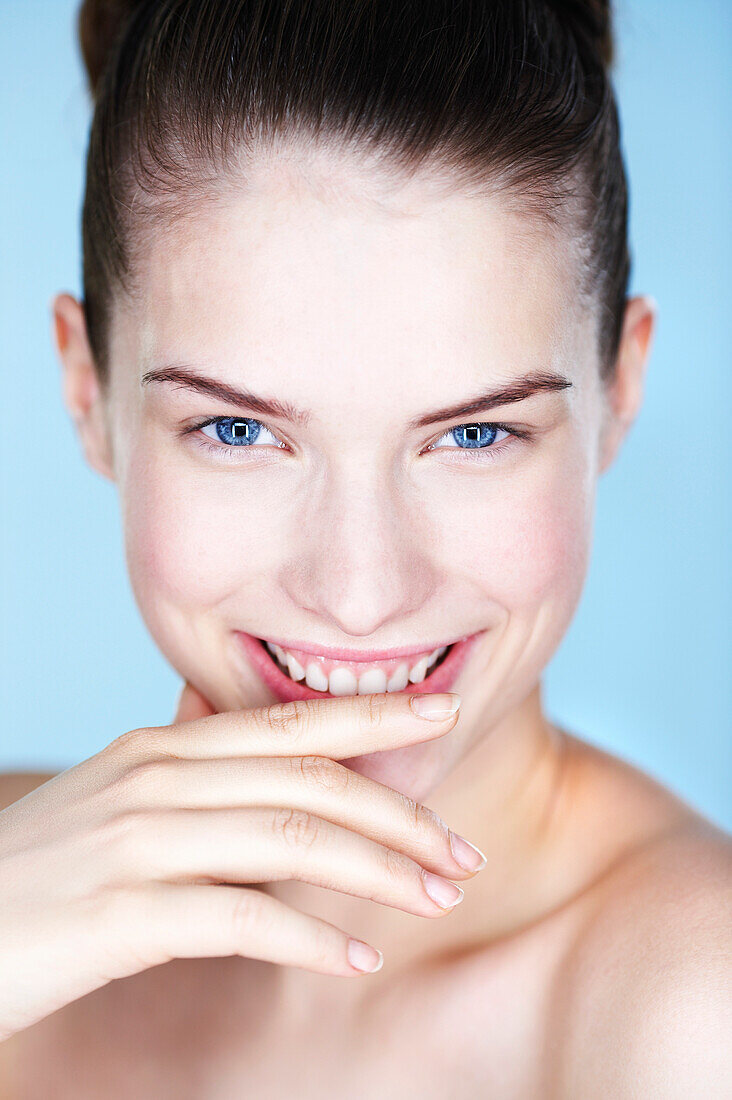 Portrait of young smiling woman