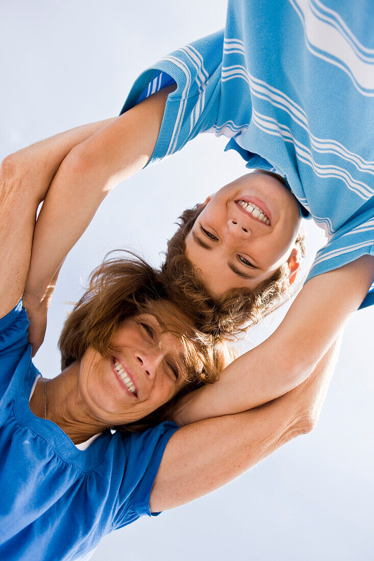 Woman and her grandson huddle together