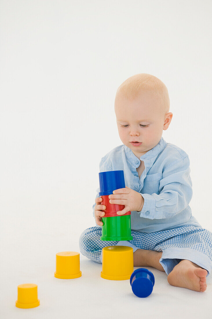 Baby boy stacking blocks